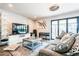 Modern living room featuring a comfortable gray couch, television and contemporary decor at 11215 N 37Th Ave, Phoenix, AZ 85029