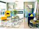 Comfortable living room with modern fireplace, stylish decor, with a blue couch and bright yellow chair at 11215 N 37Th Ave, Phoenix, AZ 85029