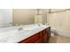 Bathroom featuring a dual sink vanity, tile floors and a shower-tub combination, neutral walls at 13615 W Merrell St, Avondale, AZ 85392
