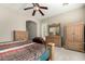 Cozy bedroom with neutral walls, soft carpet, and ample storage space at 13615 W Merrell St, Avondale, AZ 85392