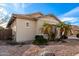 A charming single-story home featuring desert landscaping and a well-maintained exterior at 13615 W Merrell St, Avondale, AZ 85392