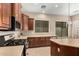 A lovely kitchen featuring stainless steel appliances and plenty of cabinet space at 13615 W Merrell St, Avondale, AZ 85392