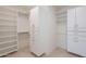 Spacious walk-in closet with custom shelving and ample storage, perfect for organizing clothes and accessories at 14445 N Valencia Dr, Fountain Hills, AZ 85268