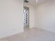 A clean, bright room with neutral walls and flooring, offering a versatile space for personalization at 14445 N Valencia Dr, Fountain Hills, AZ 85268