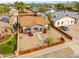 Aerial view of a desert landscaped home with a wooden fence and city views at 1514 E Fillmore St, Phoenix, AZ 85006