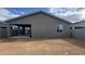 View of backyard, including a patio and fence, providing outdoor living and privacy at 15760 W Beryl Ave, Waddell, AZ 85355