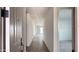 Hallway featuring neutral paint and a tile floor at 15760 W Beryl Ave, Waddell, AZ 85355