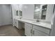 Double vanity bathroom with quartz countertops and modern fixtures at 15765 W Cheryl Dr, Waddell, AZ 85355