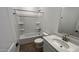 A clean bathroom featuring a tub with shower, white vanity, and modern fixtures at 15765 W Cheryl Dr, Waddell, AZ 85355