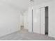 Neutral bedroom with carpet, closet and a view to the hallway at 15765 W Cheryl Dr, Waddell, AZ 85355