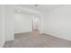 Neutral living room with carpet and views to the hallway at 15765 W Cheryl Dr, Waddell, AZ 85355