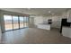 Spacious living area with lots of natural light and backyard access at 15765 W Cheryl Dr, Waddell, AZ 85355