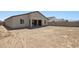 Exterior view of the home's backyard showing the home's construction at 15778 W Cheryl Dr, Waddell, AZ 85355