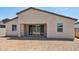 Exterior view of the home's backyard showing the home's construction at 15778 W Cheryl Dr, Waddell, AZ 85355