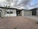 Inviting single-story home with low-maintenance landscaping and neutral exterior paint at 15778 W Cheryl Dr, Waddell, AZ 85355