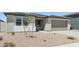 Attractive one-story house featuring low-maintenance desert landscaping, and a convenient two-car garage at 15778 W Cheryl Dr, Waddell, AZ 85355