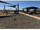 Shaded playground with swings and picnic area at 15778 W Cheryl Dr, Waddell, AZ 85355