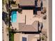 An aerial view of the home showcasing a private pool and a well-maintained tiled roof at 15825 S 1St Ave, Phoenix, AZ 85045
