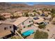 Aerial view of a home featuring a backyard pool and desert views at 15825 S 1St Ave, Phoenix, AZ 85045