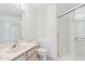 Bathroom featuring a glass shower and a single sink vanity at 15825 S 1St Ave, Phoenix, AZ 85045