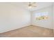 Bedroom with carpeted floor and a window overlooking a view of the city at 15825 S 1St Ave, Phoenix, AZ 85045
