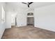 Large primary carpeted bedroom with adjoining bathroom and vaulted ceilings at 15825 S 1St Ave, Phoenix, AZ 85045