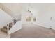 Bright living room showcasing high ceilings and a staircase at 15825 S 1St Ave, Phoenix, AZ 85045