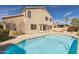 Large pool with cool blue water surrounded by a spacious patio and stucco exterior at 15825 S 1St Ave, Phoenix, AZ 85045