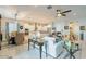 Spacious open-concept living room and kitchen area, perfect for entertaining and gatherings at 15843 S 177Th Ave, Goodyear, AZ 85338