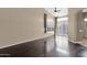 Bright bedroom with rich hardwood floors, high ceiling, and expansive windows at 16215 W Indianola Ave, Goodyear, AZ 85395