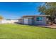 Well-kept backyard with green grass, showcasing the property's outdoor space and landscaping at 1660 W 7Th Pl, Mesa, AZ 85201