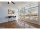 Bright dining area bathed in natural light from large windows at 1660 W 7Th Pl, Mesa, AZ 85201