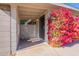 Charming front entrance features unique brickwork and mature foliage at 1660 W 7Th Pl, Mesa, AZ 85201