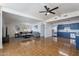 Spacious living area features an open floor plan and modern ceiling fan at 1660 W 7Th Pl, Mesa, AZ 85201