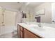 Bathroom with double sink vanity and updated fixtures at 17705 N Vera Cruz Ave, Maricopa, AZ 85139