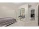 Bedroom featuring soft carpet and a mirrored sliding door closet at 17705 N Vera Cruz Ave, Maricopa, AZ 85139