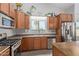 Well-equipped kitchen featuring stainless steel appliances and ample counter space at 17705 N Vera Cruz Ave, Maricopa, AZ 85139