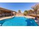 Private fenced pool with blue water at 17705 N Vera Cruz Ave, Maricopa, AZ 85139