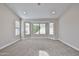 Spacious bedroom featuring new carpet, neutral walls, and lots of natural light at 19824 N 94Th Ln, Peoria, AZ 85382