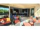 Inviting outdoor patio and a glimpse of the home's open floor plan, creating a relaxed setting at 2535 E Thornton Ct, Gilbert, AZ 85297