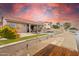 Beautiful backyard with a pool, a wooden boat dock, a manicured lawn, and serene lake views at 3121 N Meadow Dr, Avondale, AZ 85392