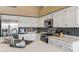 Kitchen featuring stainless steel appliances, quartz countertops and a tiled backsplash at 3121 N Meadow Dr, Avondale, AZ 85392