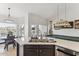 Spacious island with views of the breakfast nook, game room and stainless steel appliances at 3121 N Meadow Dr, Avondale, AZ 85392