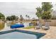 Beautiful pool overlooking the waterfront offers a private oasis with picturesque views and lounge seating at 3121 N Meadow Dr, Avondale, AZ 85392