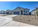 Charming single-story home with a desert-landscaped yard and a two-car garage at 3353 W Shanley Ave, Apache Junction, AZ 85120