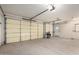 Spacious garage with automatic door at 38408 N 23Rd Dr, Phoenix, AZ 85086