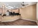 Charming kitchen boasts wood cabinets, granite countertops, and modern appliances at 38408 N 23Rd Dr, Phoenix, AZ 85086