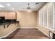 Charming kitchen featuring wood cabinets, granite countertops, and bright natural light at 38408 N 23Rd Dr, Phoenix, AZ 85086