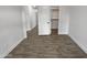 This bedroom features wood-look tile flooring and a closet at 4102 E Morrow Dr, Phoenix, AZ 85050