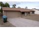 Charming single-Gathering home with a two-car garage and a spacious concrete driveway at 4110 W Cholla St, Phoenix, AZ 85029